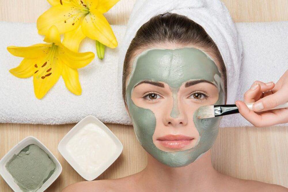 Apply detox mask for acne skin